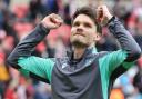 Danny Rohl celebrates Sheffield Wednesday's survival at the Stadium of Light