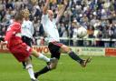 Darlington striker Barry Conlon attempts to block a clearance during Quakers' last match at Feethams in May 2003