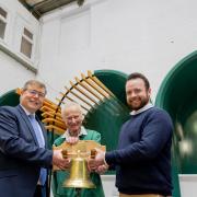 MP Peter Gibson, Market holder Robin Blair and Michael Harvey Market manager with the new bell which is to be installed in Darlington Indoor market Picture: SARAH CALDECOTT