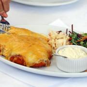 TRADITIONAL DISH: A good-looking parmo, accompanied by another Teesside tradition of creamed cabbage, but for full authenticity, it should be served on a bed of chips