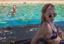 A Bigger Splash. Pictured: Dakota Johnson and Ralph Fiennes