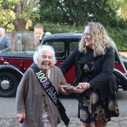 Molly arrives in style for her 100th birthday party. Picture: Peter Barron