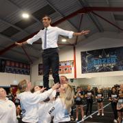 Rishi Sunak joins members of the Lazer Scarlet team in one of their routines