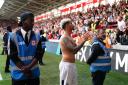 Newcastle's Bruno Guimaraes in front of the fans after the win at Brentford