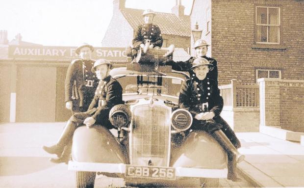 The Northern Echo: National Fire Service members in Barnard Street, Darlington, during the war. Picture courtesy of Brett Clayton