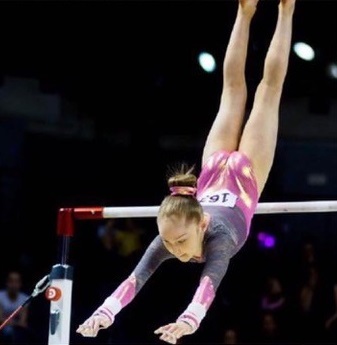 Mia Scott in action on the bars