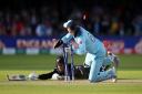 Jos Buttler runs out New Zealand's Martin Guptill to win the World Cup for England