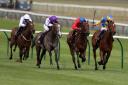 Sacred ridden by James Doyle (second right) goes on to win the Betway EBF Stallions Maiden Fillies' Stakes at Newmarket