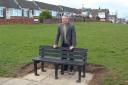 Councillor John Tennant with one of the new benches at Throston Grange