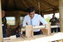 Rishi Sunak tries his hand on the pole lathe in The Fold’s Veteran’s woodcraft shelter