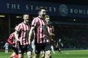 Luke O'Nien leads the celebrations after opening the scoring for Sunderland at QPR