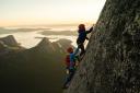 Leo Houlding, pictured here climbing with his son, will share some of his epic life stories
