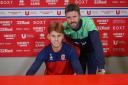Teenage midfielder Luke Woolston has signed a new deal with Middlesbrough