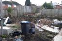 The eight people who appeared in court were all accused of leaving waste in their garden and failing to clear it in the timeframe