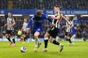 Elliot Anderson battles for the ball with Chelsea's Conor Gallagher