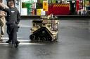 A robot pictured at the scene earlier on Wednesday afternoon.