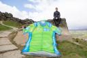 Picture by Alex Whitehead/SWpix.com - 29/04/2015 - Cycling - Tour de Yorkshire - Ilkley, Yorkshire, England - Team Sky cyclist Ben Swift is pictured with a giant Yorkshire Bank Sprinters Jersey near the Cow and Calf rocks in Ilkley Moor ahead of the inaug