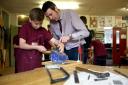 Foundation for Jobs feature on Hurworth School engineering teacher Jamie Smith during one of his classes.  Making garden tools with Jack Hobbs (13). Picture: CHRIS BOOTH (29388598)
