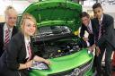 LEARNING: Darlington School of Mathematics and Science students get under the bonnet at Vauxhall dealer Sherwoods. Pictured are Rebecca Smith, Kristen Morrison, Nizam Uddin and Carl Younghusband