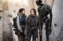 Undated Film Still Handout from Rogue One: A Star Wars Story. Pictured: Cassian Andor (Diego Luna), Jyn Erso (Felicity Jones) and K-2SO (Alan Tudyk). See PA Feature FILM Jones. Picture credit should read: PA Photo/Lucasfilm. WARNING: This picture must