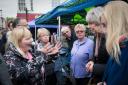 Prime Minister Theresa May meets Cathy Mohan at Abingdon market in Oxfordshire during an General Election campaign visit. PRESS ASSOCIATION Photo. Picture date: Monday May 15, 2017. See PA story ELECTION stories. Photo credit should read: Stefan Rousseau/