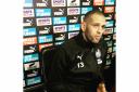 NEW BOY: Islam Slimani speaking to the media at Newcastle's training ground. Picture: PAUL FRASER