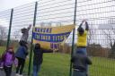 FLAG BEARERS: Marske fans raise the flag before the first leg of last Saturday's FA Vase semi-final with Stockton Town