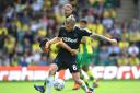 Norwich City's Emi Buendia (left) and Middlesbrough's Adam Clayton during the Sky Bet Championship match at Carrow Road, Norwich. PRESS ASSOCIATION Photo. Picture date: Saturday September 15, 2018. See PA story SOCCER Norwich. Photo credit should 