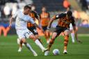 CONTRIBUTE: Middlesbrough midfielder Jonny Howson battles with Hull City defender Tommy Elphick
