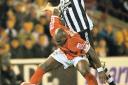 TOWERS OF STRENGTH: Newcastle’s Andy Carroll and Barnsley’s Darren Moore