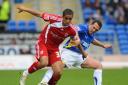BACK OFF: Middlesbrough’s Kyle Naughton holds off Cardiff City striker Michael Chopra