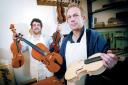 NO STRINGS: Chris Manship, left, and Sean Galvin with some of the violins they make at their Preston Hall Museum workshop