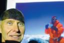INSPIRATION: Alan Hinkes with a picture of himself on the peak of Dhaulagiri in 2005 holding photographs of his daughter and grandson