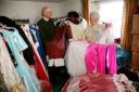 ALL DRESSED UP: John Anderson and Marjorie Taylor sort out Wolsingham Music Makers’ costumes which are on offer to another drama or musical group