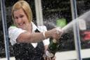 THAT'S RICH: Kelly Rich celebrates her 100,000 win on a Lottery scratchcard