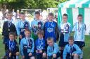 The team with their Fair Play trophy and runners-up medals