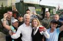 YES TO PUBLICITY: Gary and Ann Henry with customers at their burger bar. As a councillor, Gary said people had a right to know about his win