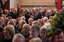 STANDING ROOM ONLY: Some of the 350 people who filled the church for the service