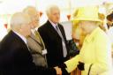PROUD MOMENT: Arthur Bartholomew shakes hands with the Queen during her visit to open a commemorative site marking the location of the old colliery