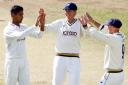 Moin Ashraf celebrates a wicket against Glamorgan with Joe Root and Adam Lyth