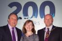 CHAIN OF OFFICE: Mike Matthews (right) and Dave Laws with NECC chairman Lucy Winskell.