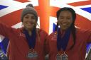 MEDAL WINNERS: Mica McNeill and Mica Moore celebrate their successes in Calgary