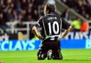 Former Newcastle United striker Michael Owen shows his disappointment after missing a chance against Portsmouth