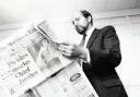 Peter Sands casts an eye over his broadsheet newspaper in January 1990