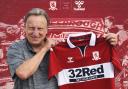 Middlesbrough manager Neil Warnock shows off the club's new home kit, which was unveiled earlier this week Picture: MFC