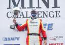 Max Coates celebrates after winning on the opening weekend of the Mini Challenge series (Picture: Jakob Ebrey)