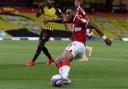 Britt Assombalonga in action at Vicarage Road