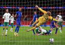Harry Maguire (right) heads England’s opening goal past Republic of Ireland goalkeeper Darren Randolph Pictures: PA WIRE