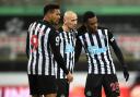 Newcastle United's Joe Willock, right, with Joelinton and Jonjo Shelvey celebrate after the final whistle during the Premier League match at St James' Park, Newcastle, this weekend