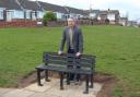 Councillor John Tennant with one of the new benches at Throston Grange